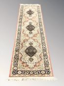 A machine made Persian design runner,