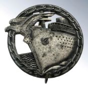 A Second World War German zinc Blockade Runners badge.