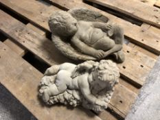 Two concrete cherub garden ornaments,