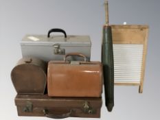 A group of vintage luggage cases, further metal tin, a bamboo parasol,