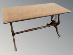 A reproduction mahogany rectangular coffee table, width 82 cm.