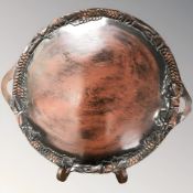 An oriental lacquered twin-handled serving tray on stand, width 68 cm.