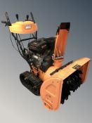 A Rock Machinery Model 10 11HP snow thrower, with Loncin 337cc gasoline engine.