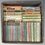 A collection of Ladybird volumes, Biggles volumes, etc.