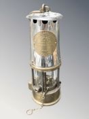 An Eccles Protector Type G6RS miner's safety lamp.