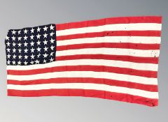 A vintage American flag with forty eight stars, 180 cm x 84 cm.