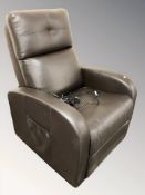 A contemporary stitched brown leather electric reclining armchair, width 72 cm.
