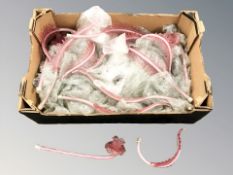 A quantity of cranberry glass epergne branches.