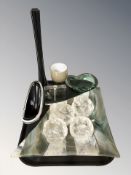 A set of four Scandinavian textured glass tea light holders,