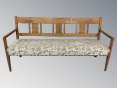 A early 20th century pine bench, length 186 cm.