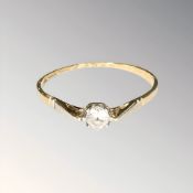 An 18ct gold diamond solitaire ring, size S½ (shank worn thin) CONDITION REPORT: 1.