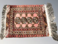 A Turkoman rug, Afghanistan, 87 cm x 54 cm.