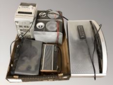 A Samsung hi-fi vintage fidelity radio and two Bose sound docks.