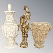 An oriental resin statue, vase and similar lamp, tallest 48 cm.