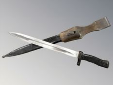 A German Ersatz all-steel bayonet, with 31cm double-edged blade, black-painted grip and scabbard,