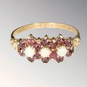 A 9ct gold ruby and opal ring,