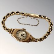 A lady's 9ct gold wristwatch on 9ct gold integral bracelet CONDITION REPORT: 8.