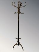 A laminated and bentwood hat and coat stand.