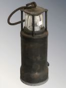 An Oldham Type C miner's lamp.