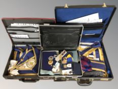 Five cases containing a collection of Masonic regalia including medals, ephemera, etc.