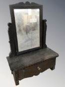 A 19th century dressing table swing mirror.