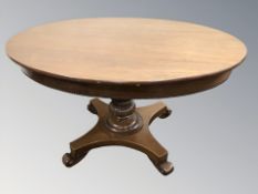 A continental oval pedestal breakfast table, width 118 cm.