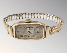 A 9ct gold octagonal-cased wristwatch on plated expanding strap CONDITION REPORT: