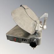 A commercial stainless steel slicer.