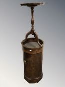 A mahogany cylindrical pot cupboard, height 76 cm, and a reproduction tripod stand / table.