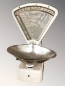 Two sets of Avery enameled grocer's scales.