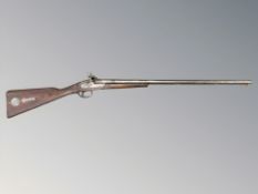 A 19th century percussion cap double-barrelled shotgun (as found) CONDITION REPORT: