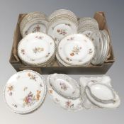 A continental porcelain part dinner service decorated with blossoms.