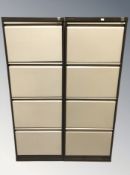 A pair of Triumph four drawer enameled metal filing cabinets, width 46 cm.