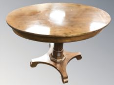 A continental oval pedestal breakfast table, width 116 cm.
