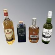 Four bottles of whiskey : Laphroaig Single Malt, 70cl, Jura Superstition, 70 cl,