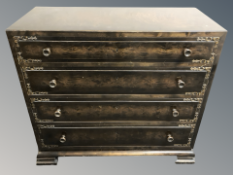 An early 20th century stained four drawer chest,