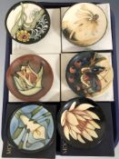 Six modern Moorcroft pin dishes, with boxes, each 12 cm diameter.