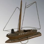 A table lamp in the form of a boat, length 40 cm.
