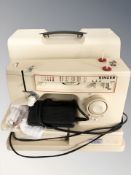 A Singer 6120 electric sewing machine, with lead and paddle.