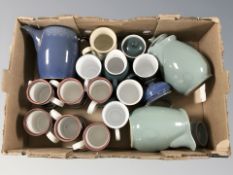 A quantity of Denby pottery mugs, jugs,