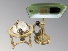 A reproduction brass banker's style desk lamp, height 40 cm, and a gemstone globe.