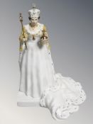 A Coalport figure celebrating the diamond jubilee of Queen Elizabeth II 2012, height 23 cm.