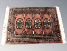 A Turkoman rug, Afghanistan, 73 cm x 49 cm.