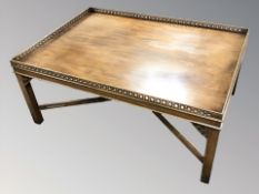 A mahogany rectangular coffee table with galleried top, 108 cm x 77 cm x 46 cm.