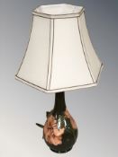 A Moorcroft clematis table lamp with shade, height 56 cm.