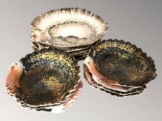 Fourteen 20th century Italian bowls and plates in the form of turkeys, largest 29 cm diameter.