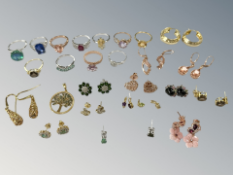 A group of sterling silver and gilded silver jewellery to include eleven dress rings,