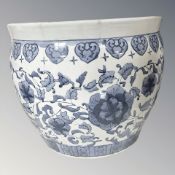 A reproduction Chinese blue and white porcelain planter, height 30 cm.