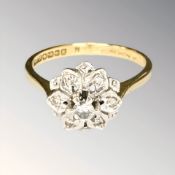 An 18ct gold diamond cluster ring, size O CONDITION REPORT: 3.