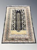 A Caucasian rug, 193 cm x 129 cm.